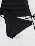 Tankini negro tirantes cruzados cintura media