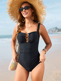 Monokini negro con falda con cuentas doradas