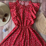 Vestido Corto Rojo con Corazones Blancos