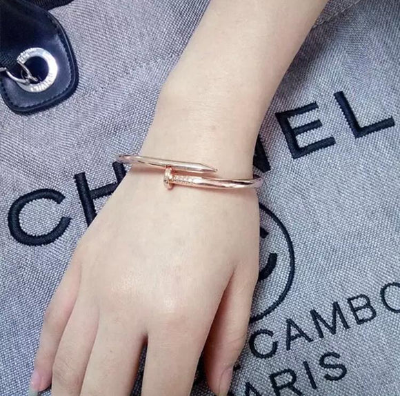 Pulsera metálica de Clavo Oro Rosa