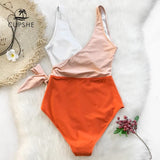 Monokini cruzado peach blanco con moña