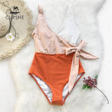 Monokini cruzado peach blanco con moña